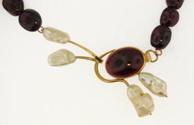 garnet, gold, and freshwater cultured pearl necklace